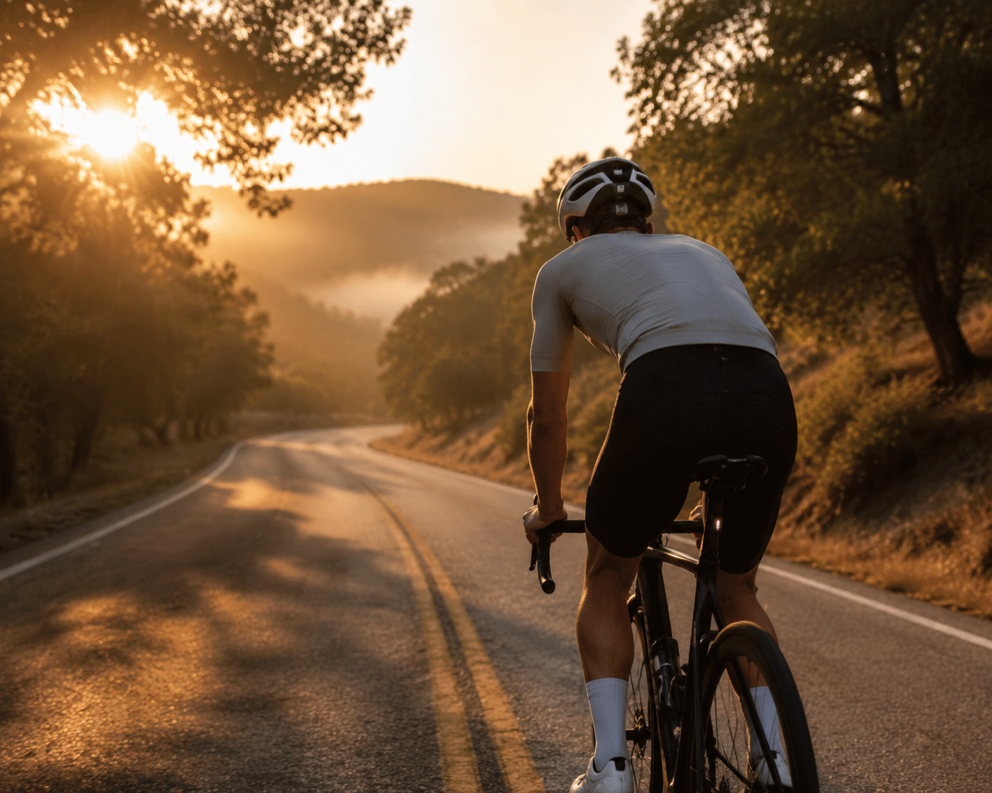 A calm road cyclist riding at dawn after a difficult night of sleep